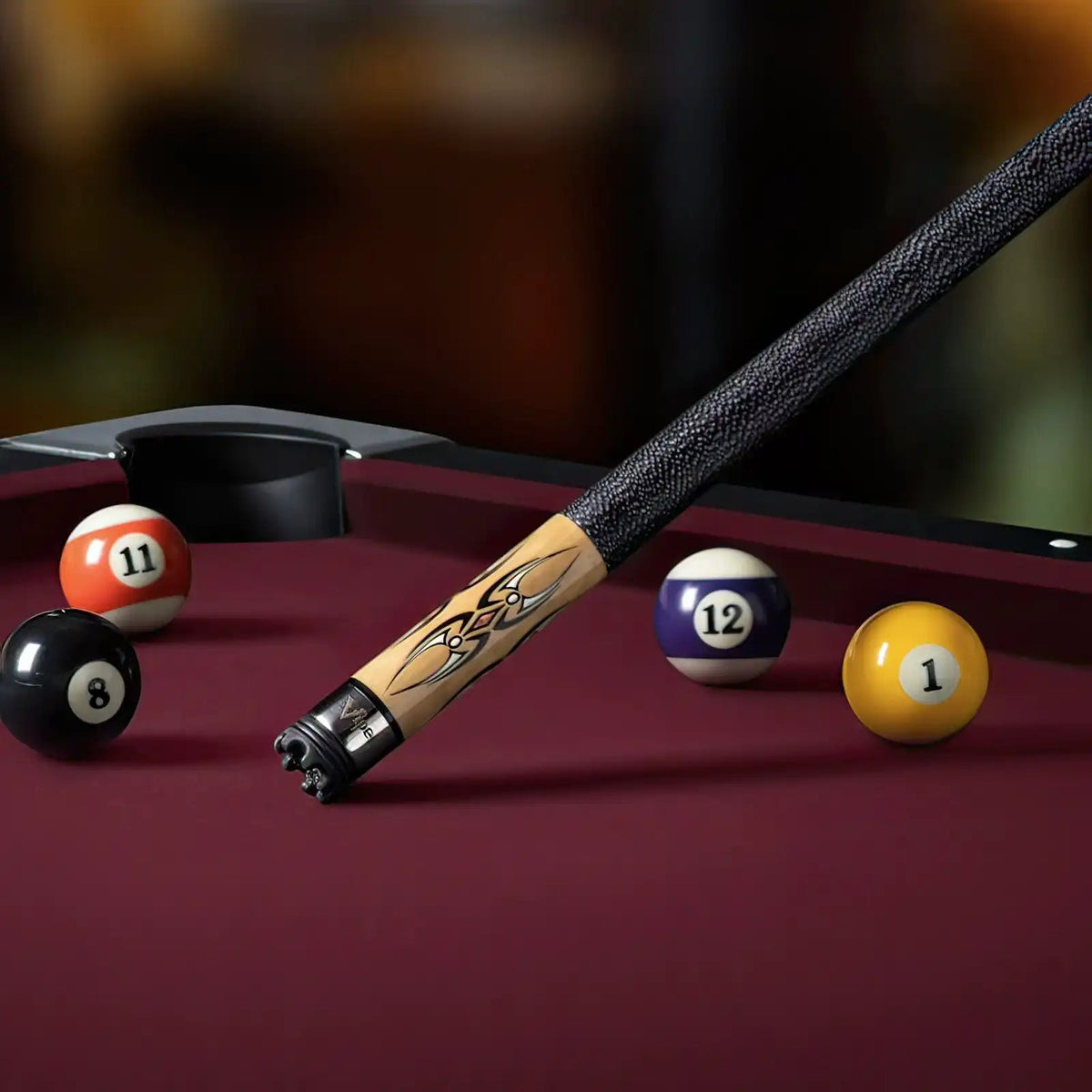 Viper Black and White Wrap Pool Cue Stick on a billiard table