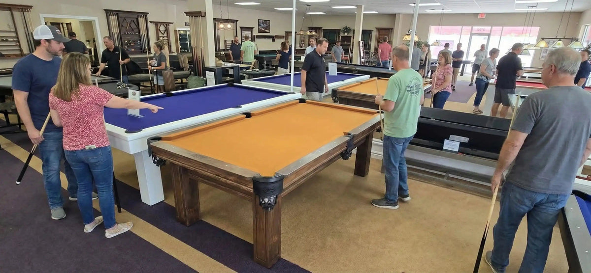 Customers exploring pool tables in Hallmark Billiards Mississauga showroom